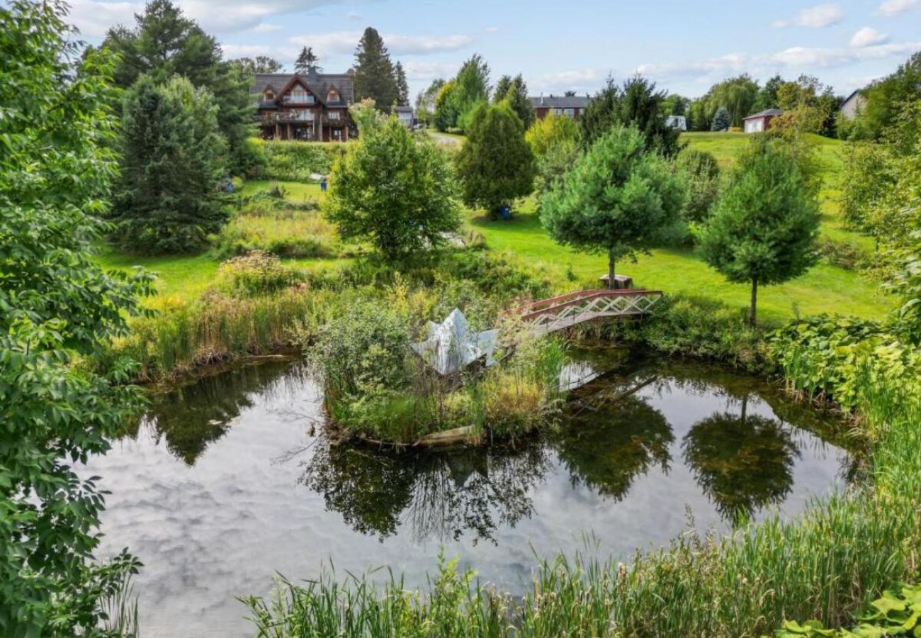 Maison à Laval - CAN017 : La Maison en Bois Rond